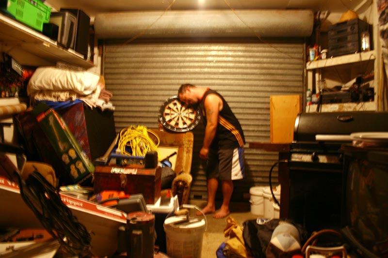 Man and dartboard